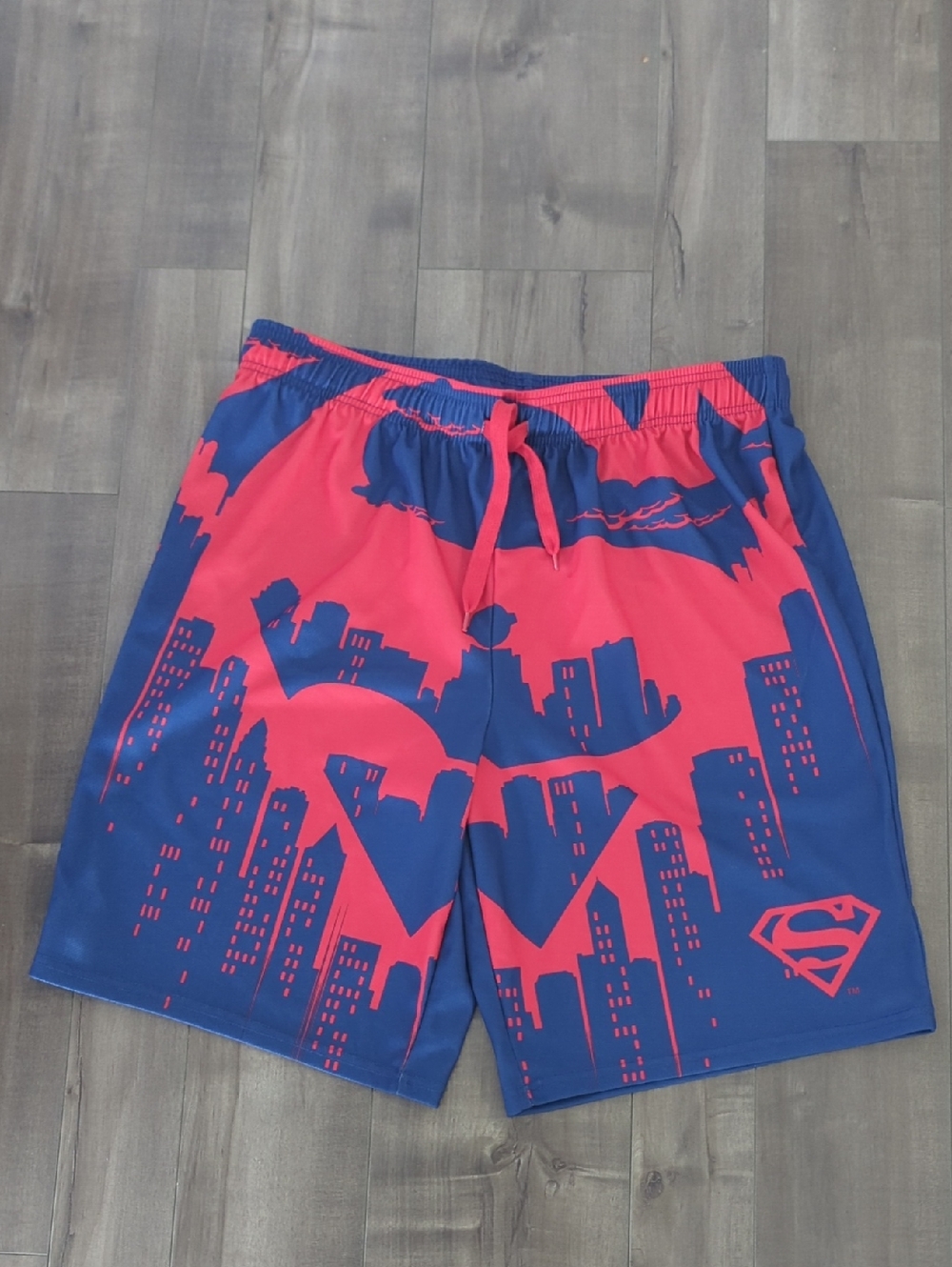 DC Comics Blue and Red Athletic Shorts with Superhero Skyline